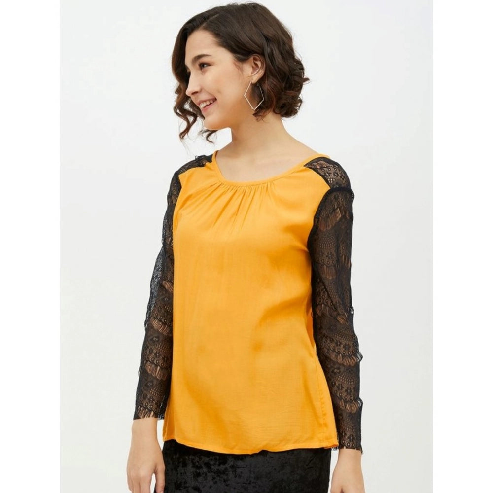 Yellow rayon top for women — close-up